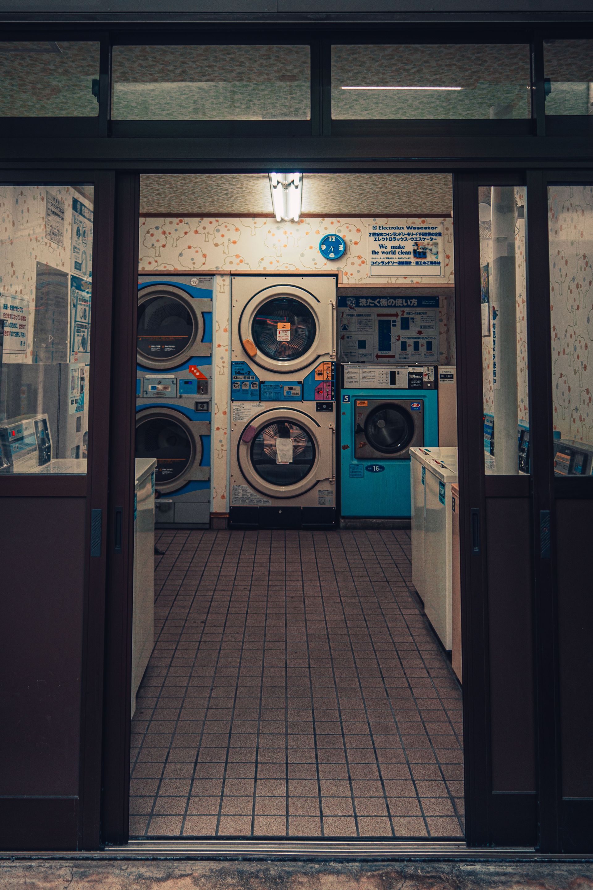 An inviting look inside a typical laundromat in Osaka, Japan.